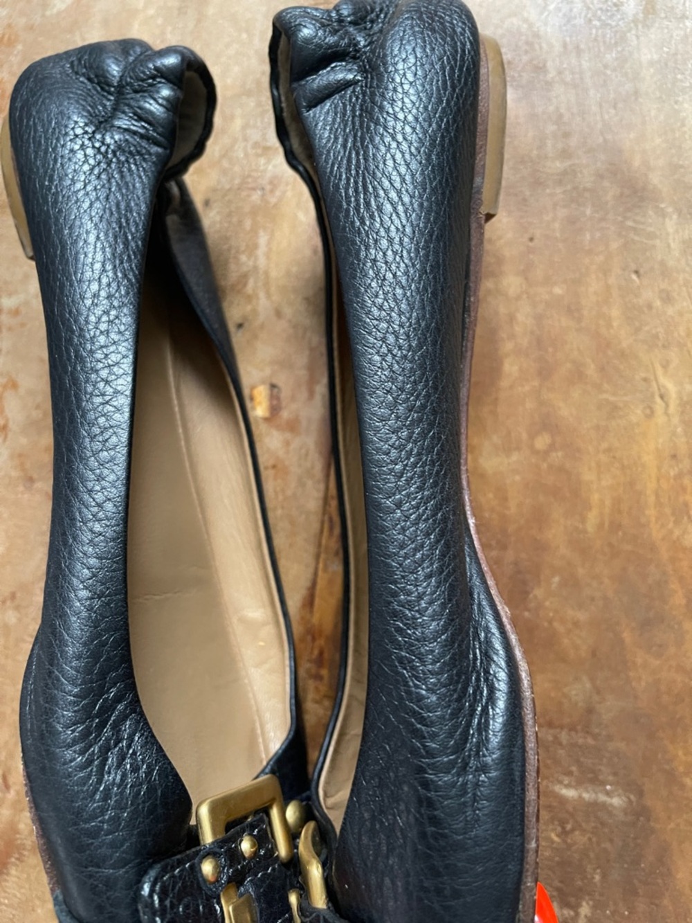 Chloe Black Leather Ballet Flats with Gold Buckle Accents - Picture 2 of 6